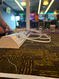 a man is working on a computer in a casino