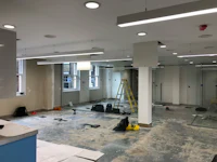 a room that is being remodeled with a glass wall