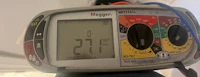 a digital thermometer with wires attached to it