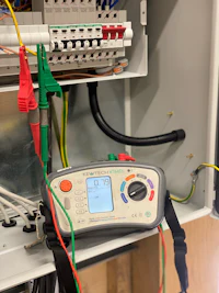 a circuit breaker with wires attached to it